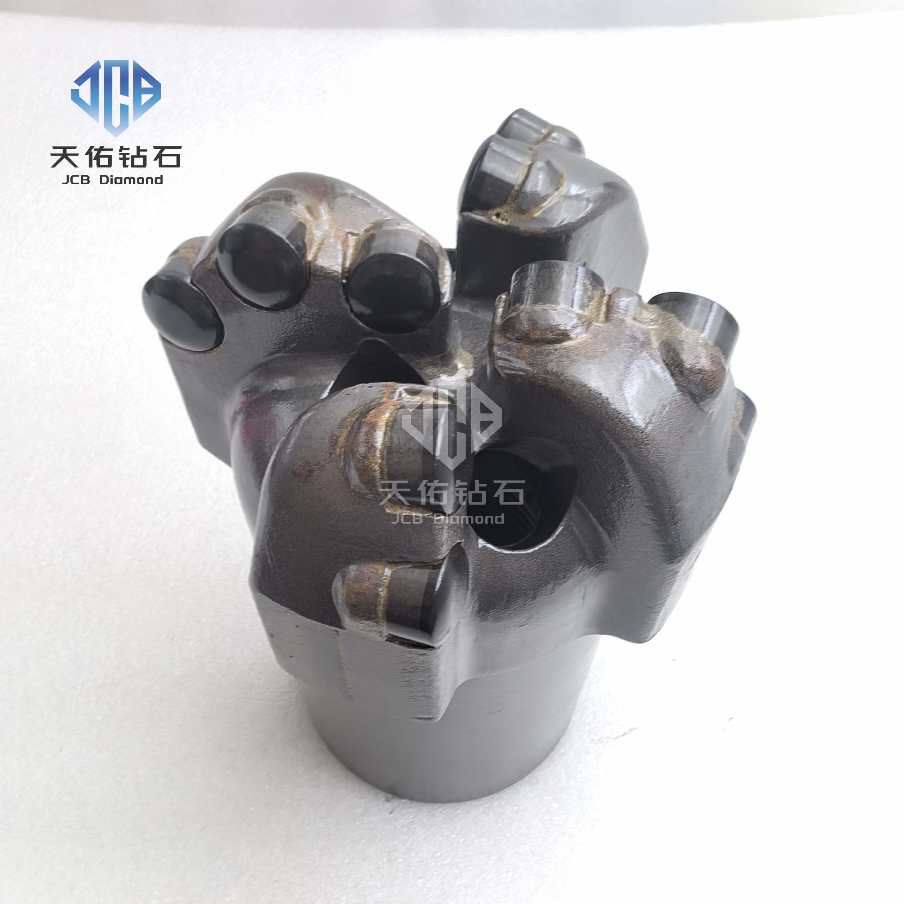 PDC drill bit with curved blades