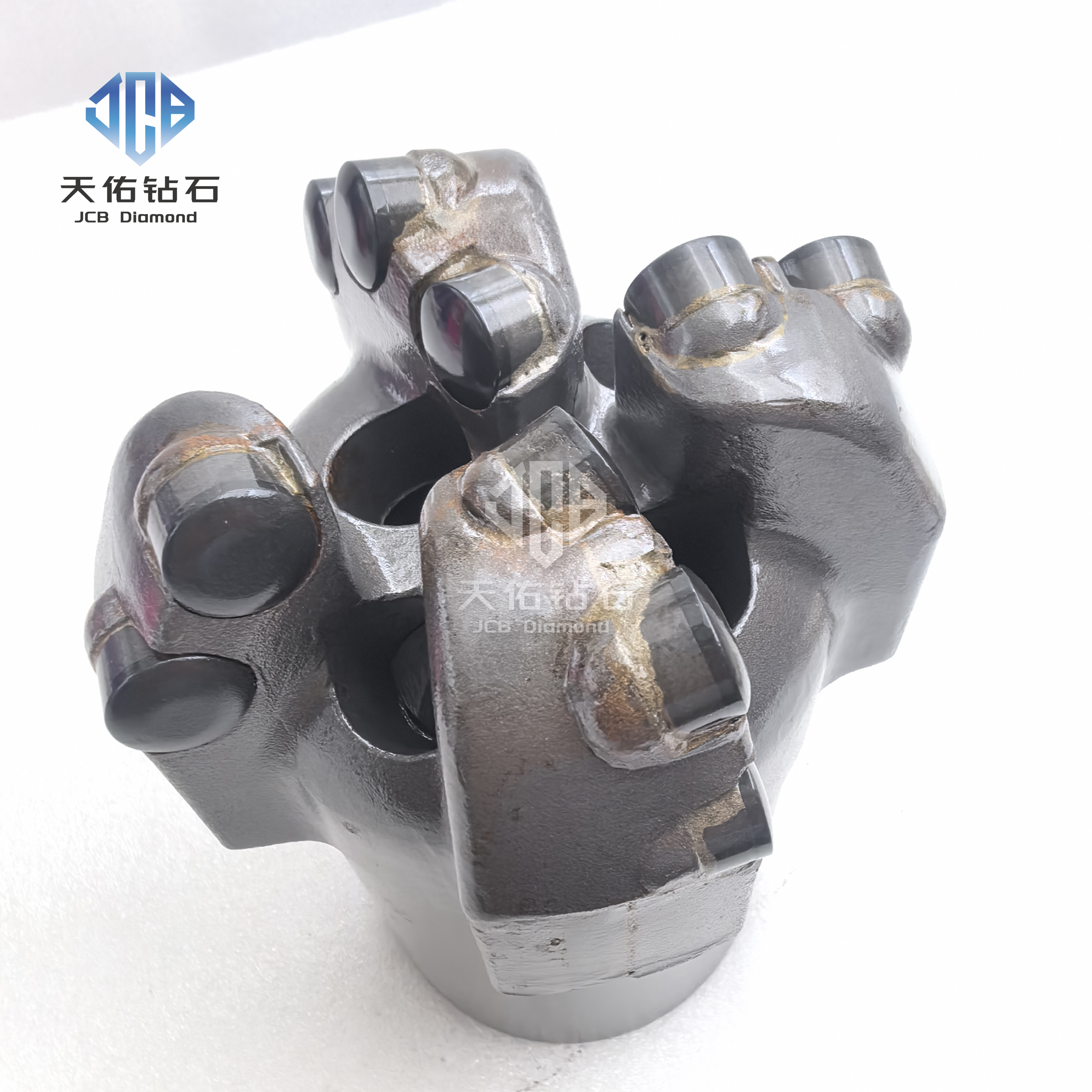 PDC drill bit with curved blades
