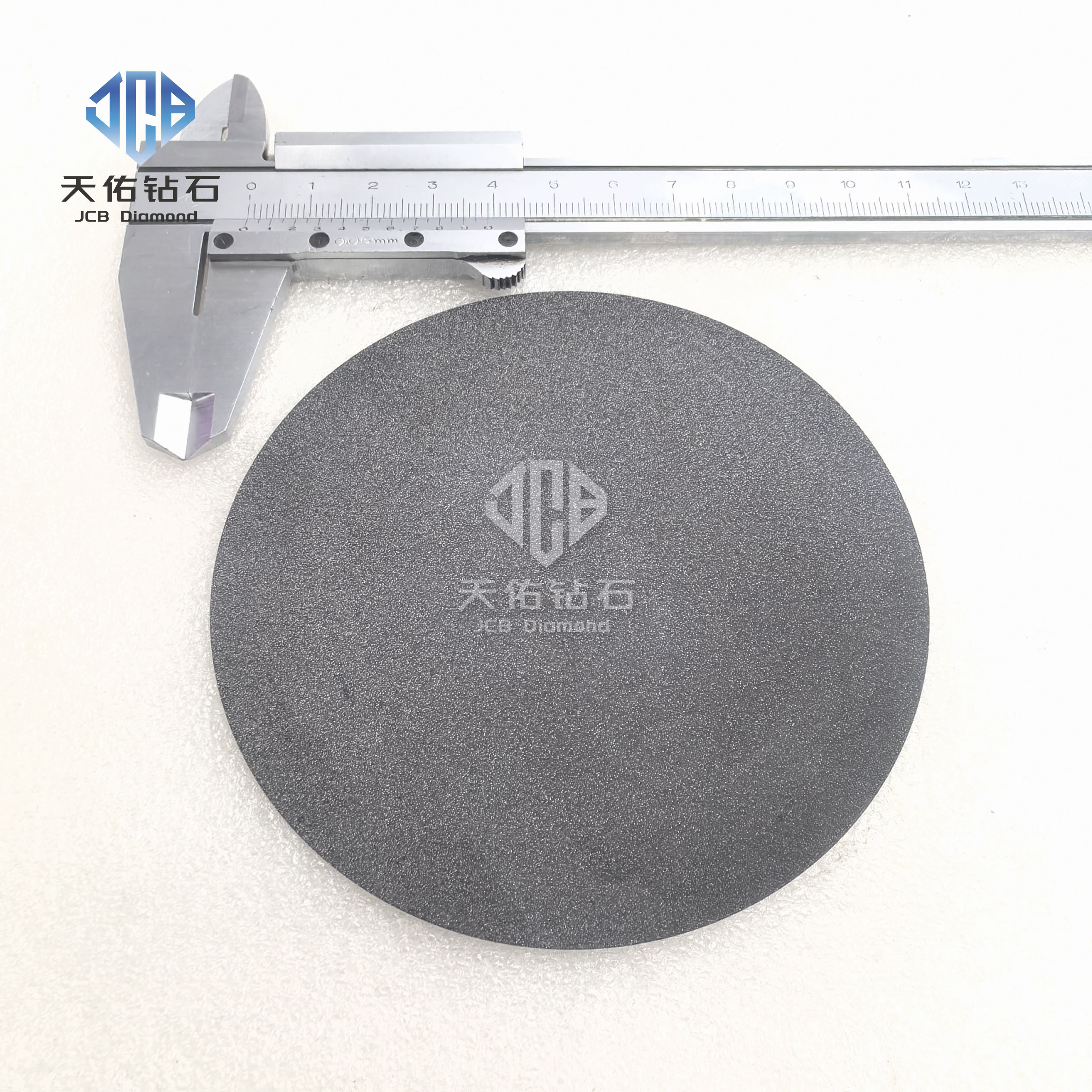 Polycrystalline diamond heat spreader